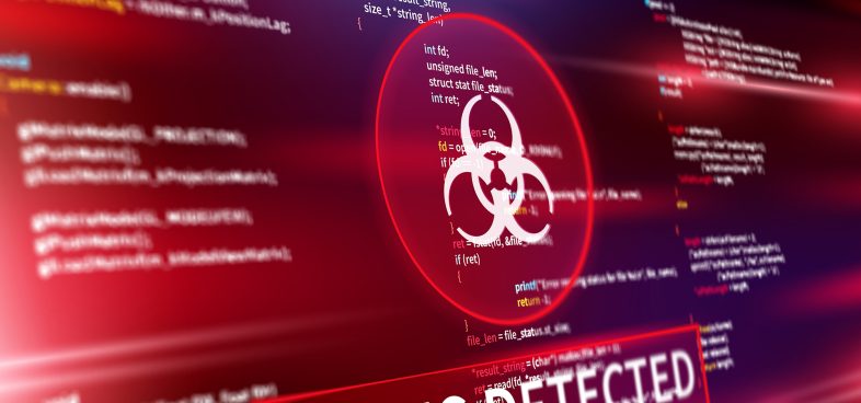 Pictorial representation of attackers targeting Souteast Asian government organization. Screen displaying code with a prominent alert symbol and the words 'VIRUS DETECTED' highlighted in red.